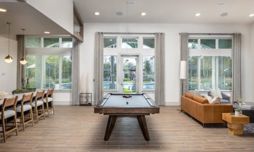 Prose Park View Well lit resident lounge with pool table and bar seating
